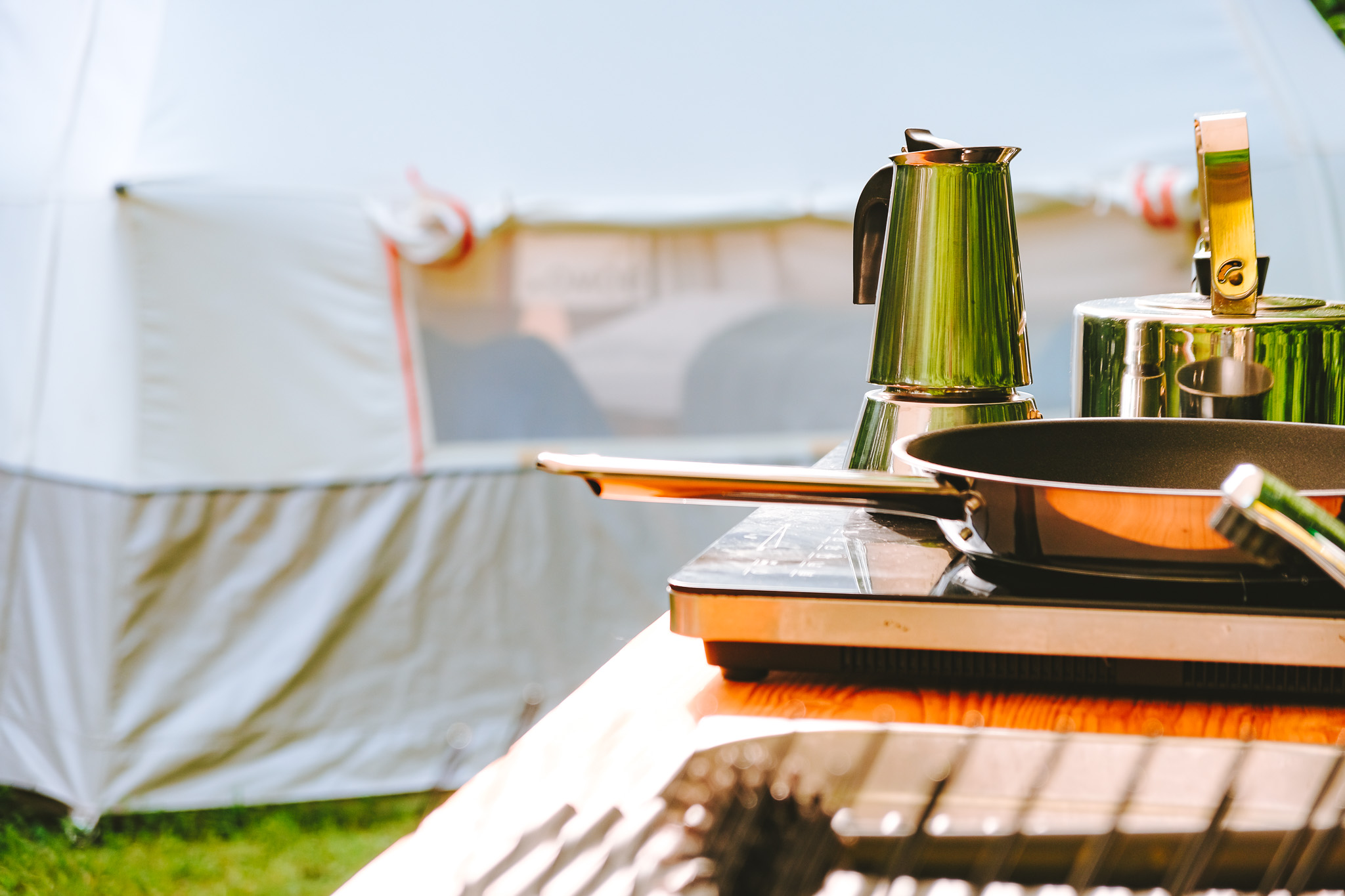 kitchen utensils with domo tent in the background